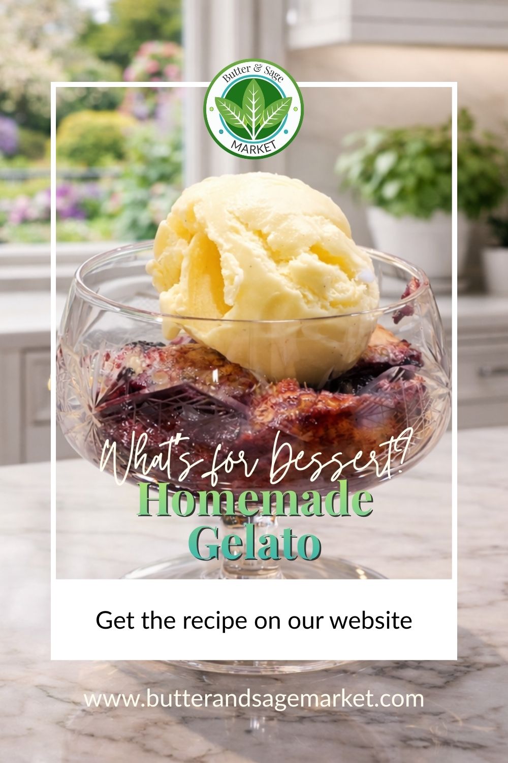 Gelato over berry cobbler in a glass dessert dish